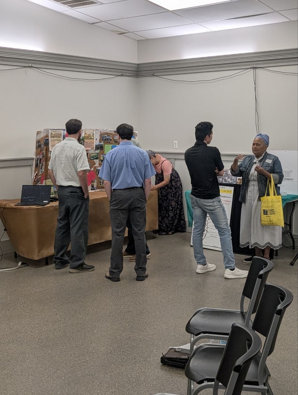 Attendees browsing display tables and connecting